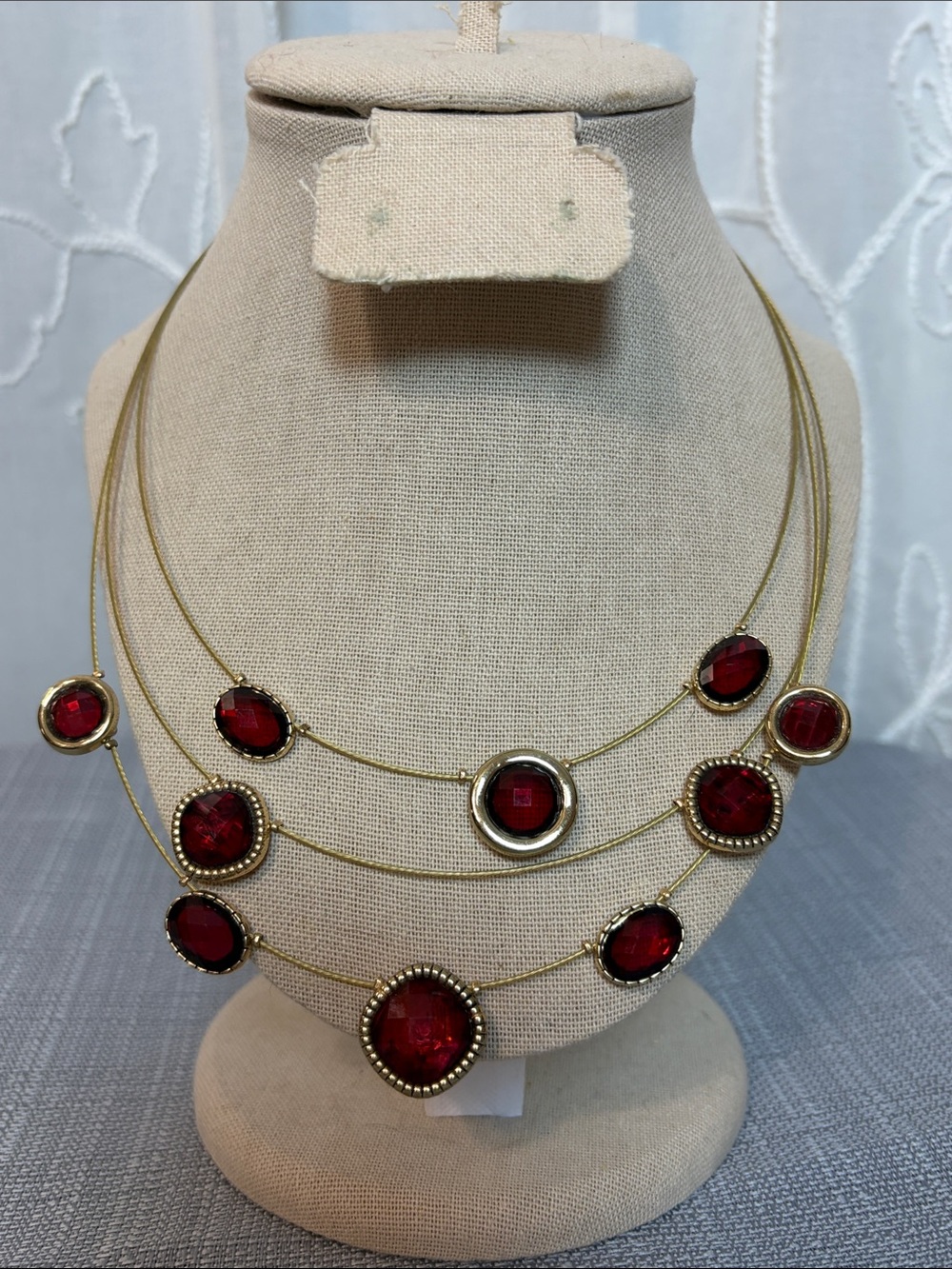 Gold Multi-Strand Necklace with Red Gem Accents